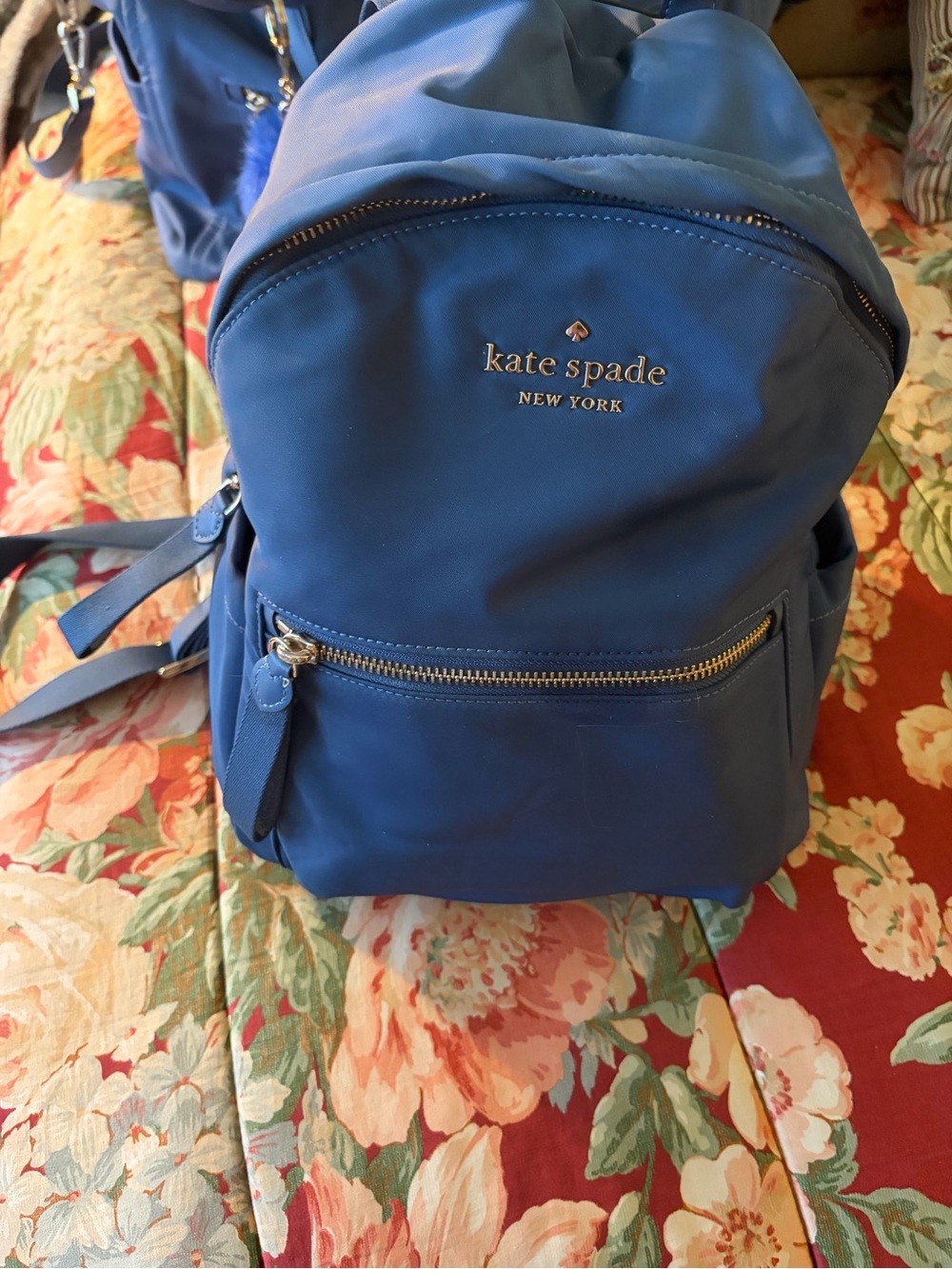 kate spade blue nylon backpack with front zip pocket